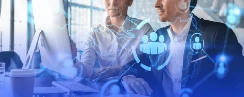 colleagues looking at screen with icons overlayed